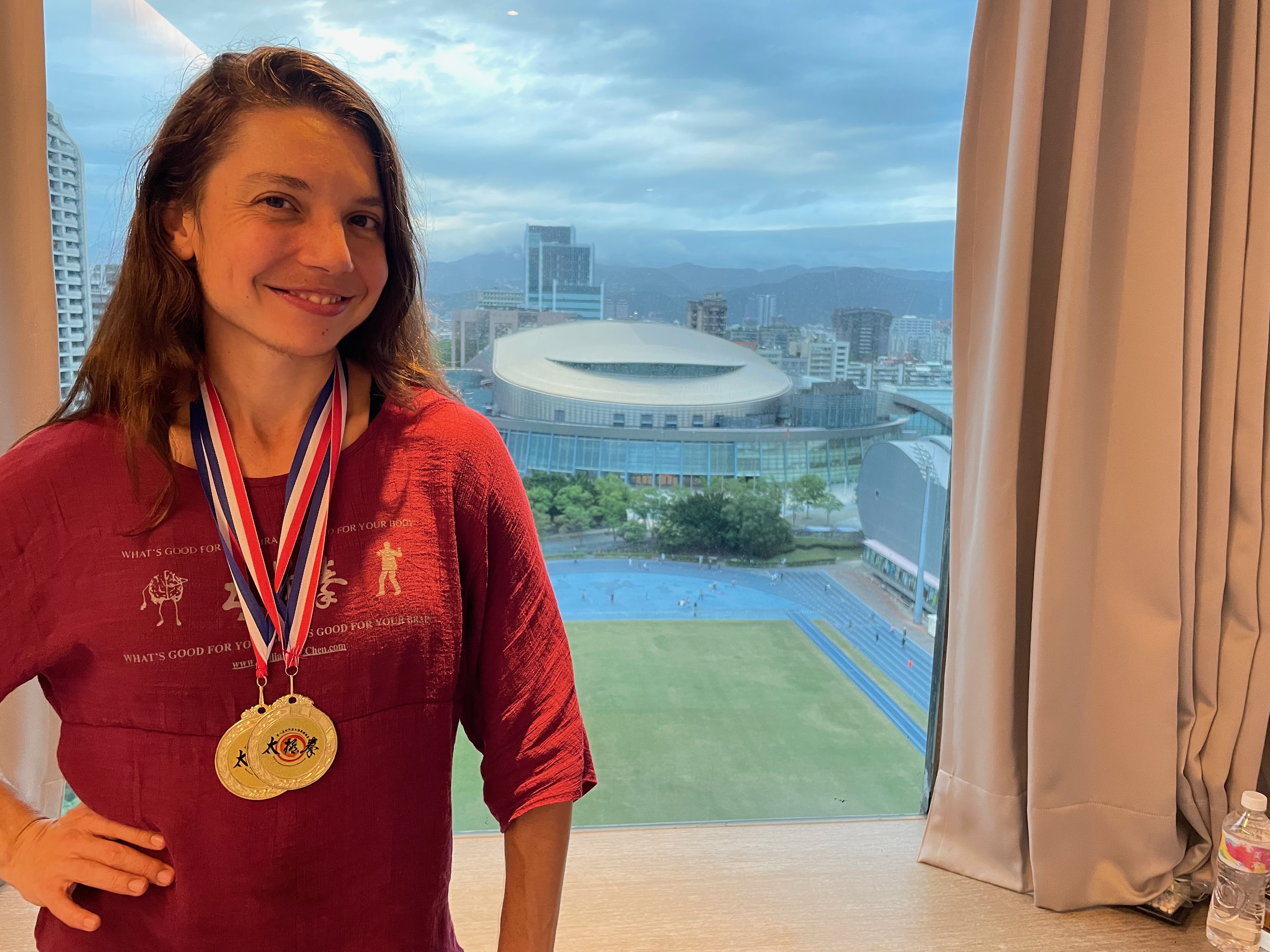Ilona Bito above Taipei Arena after winning 2 golds in the World Cup of Tai Chi 2023.
